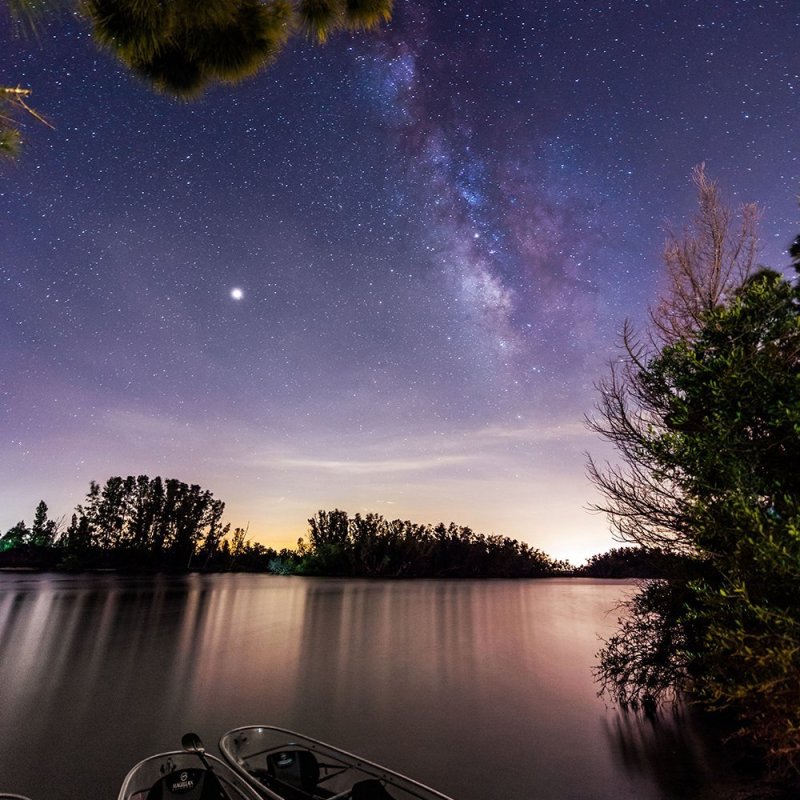 a sunset over a body of water