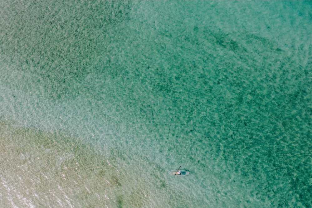 a man riding a wave in the ocean