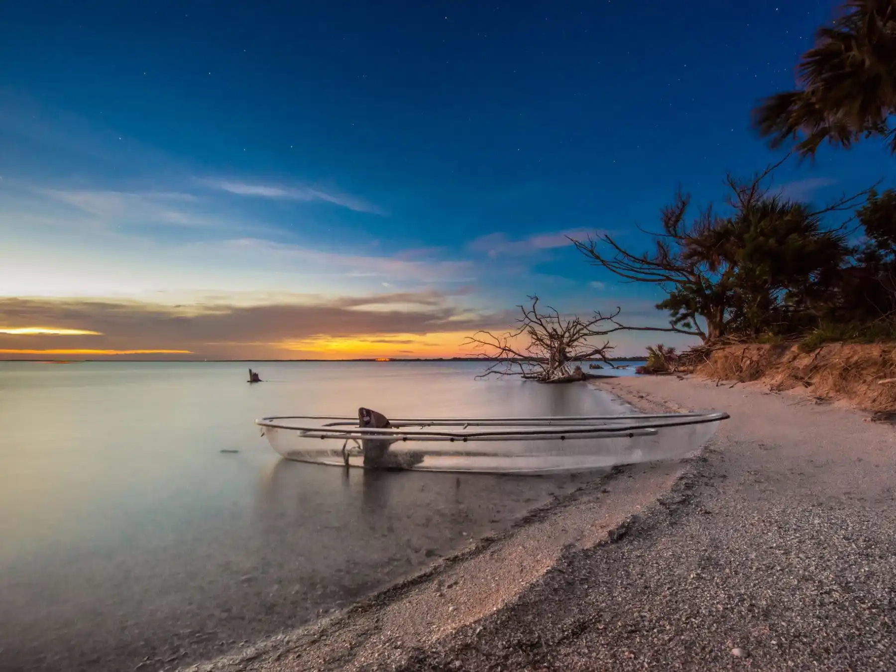 a sunset over a body of water