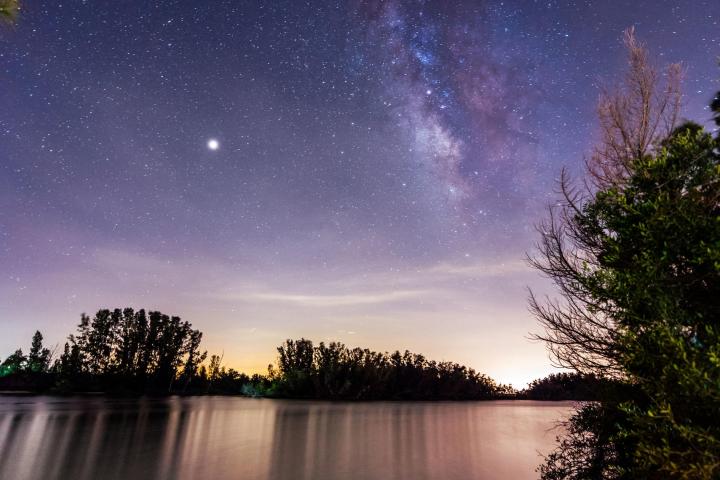 a sunset over a body of water
