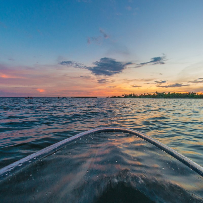 a sunset over a body of water