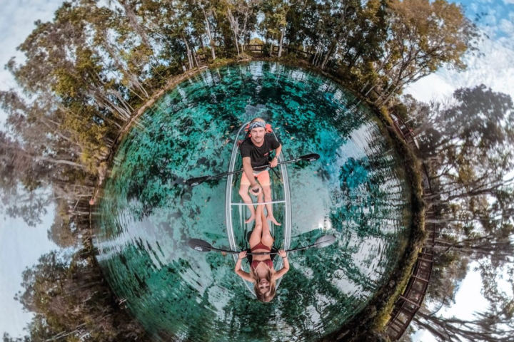 a clock sitting in the snow