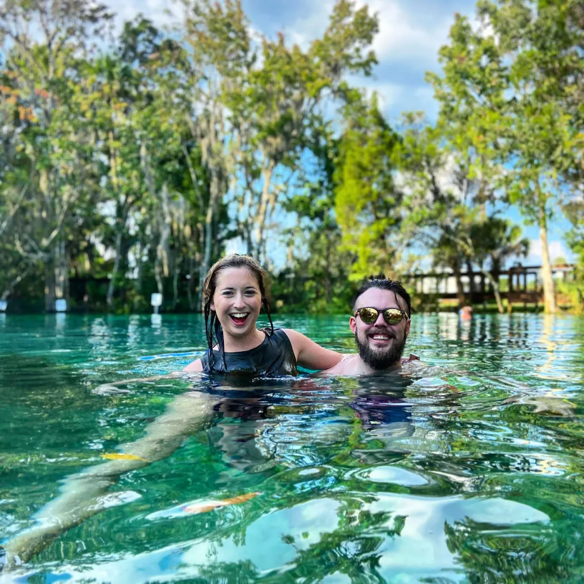a man swimming in a body of water