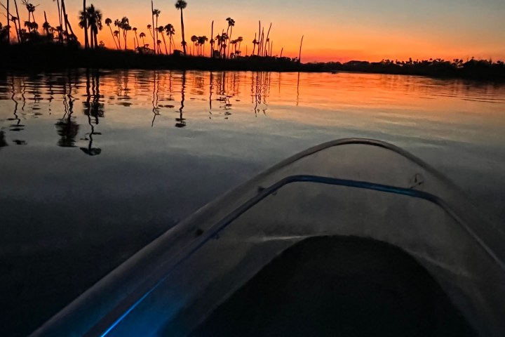 a sunset over a body of water