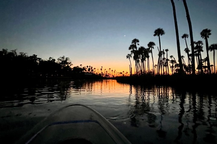 a sunset over a body of water