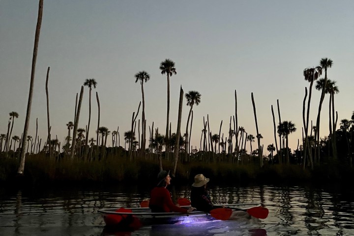 a small boat in a body of water