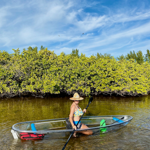 a person rowing a boat in the water