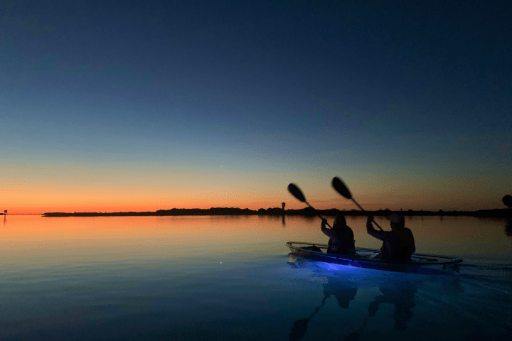 a sunset over a body of water