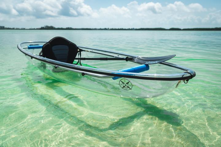 a small boat in a body of water