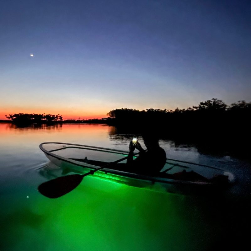 a man riding a wave on a surfboard in the water