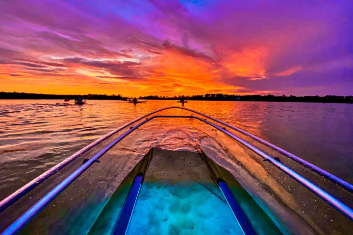 a sunset over a body of water