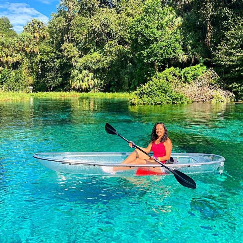 a person rowing a boat in the water