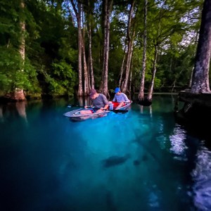 a small boat in a body of water