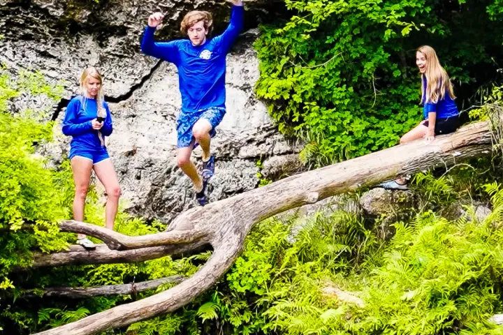 a group of people in blue water