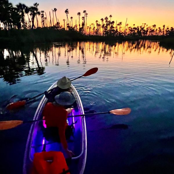 a sunset over a body of water