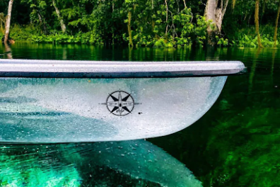 a person riding a surf board on a body of water