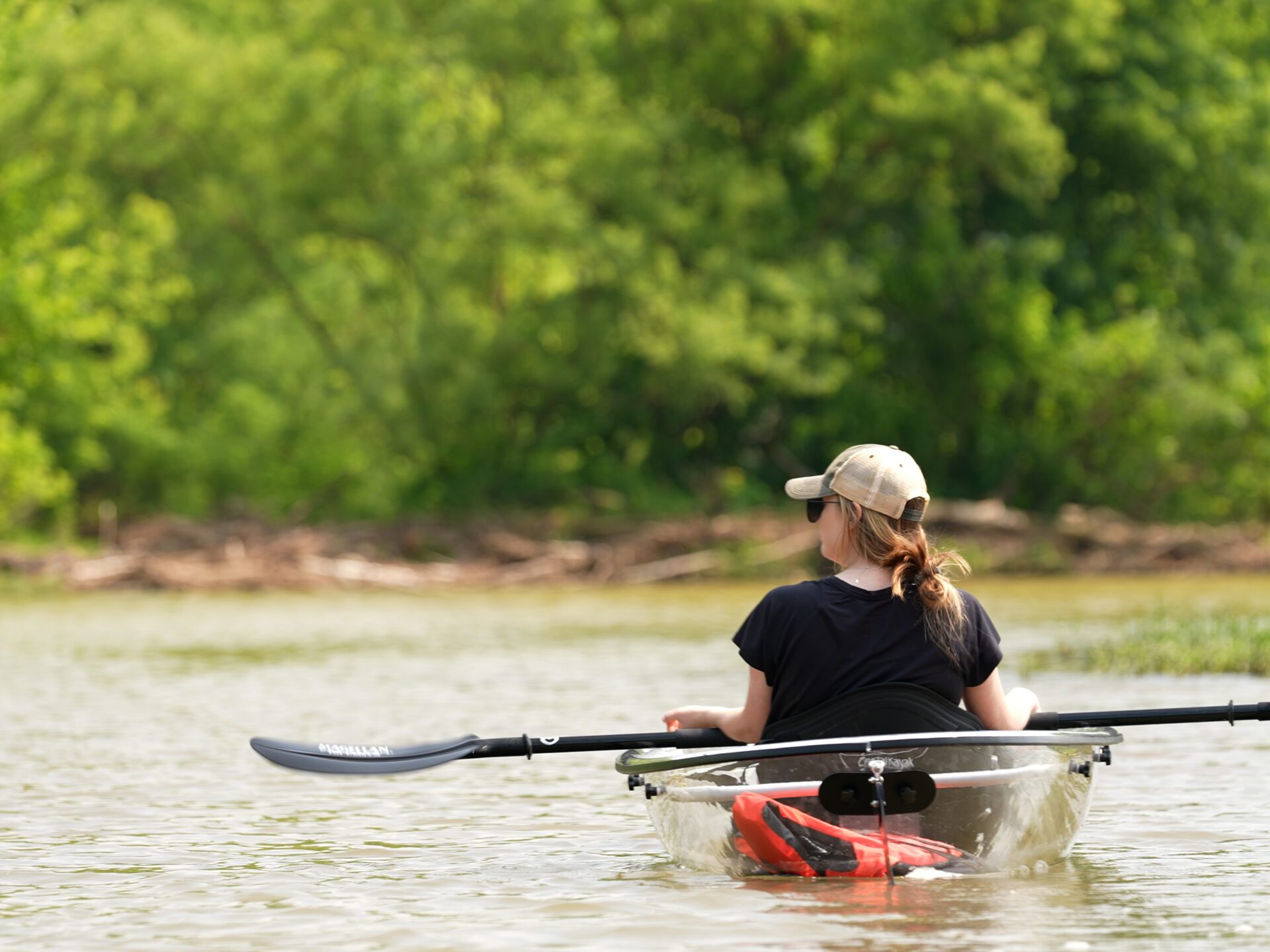a man rowing a boat in the water