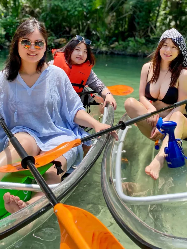xia chen et al. riding on the back of a boat