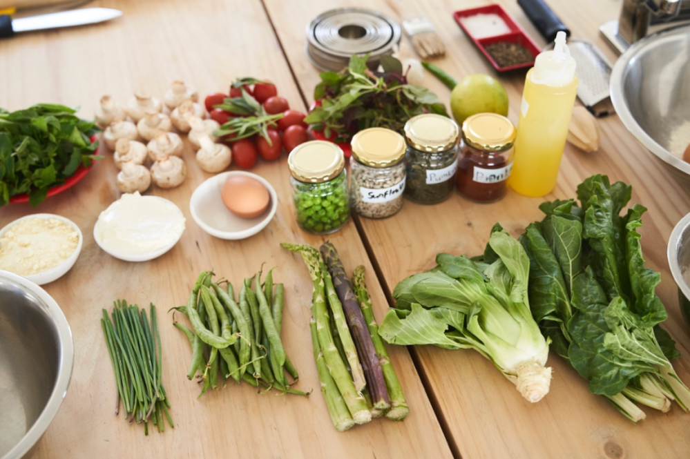 a wooden cutting board with broccoli