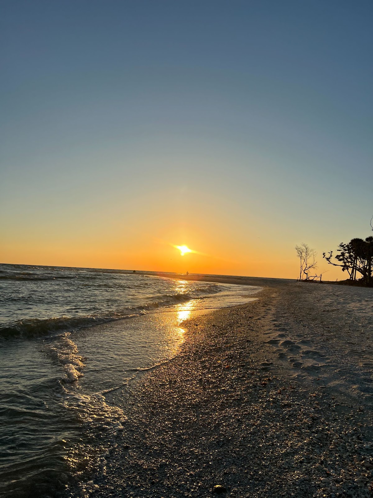 a sunset over a body of water