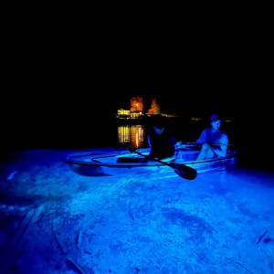 a laptop computer sitting on top of a table