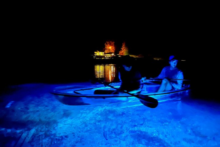 a laptop computer sitting on top of a table