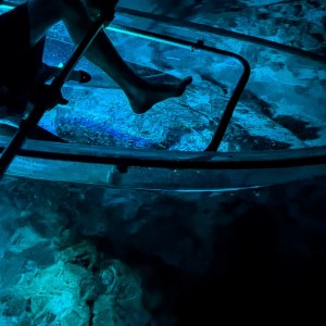 a bench sits in the dark