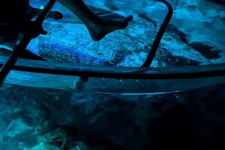 a bench sits in the dark