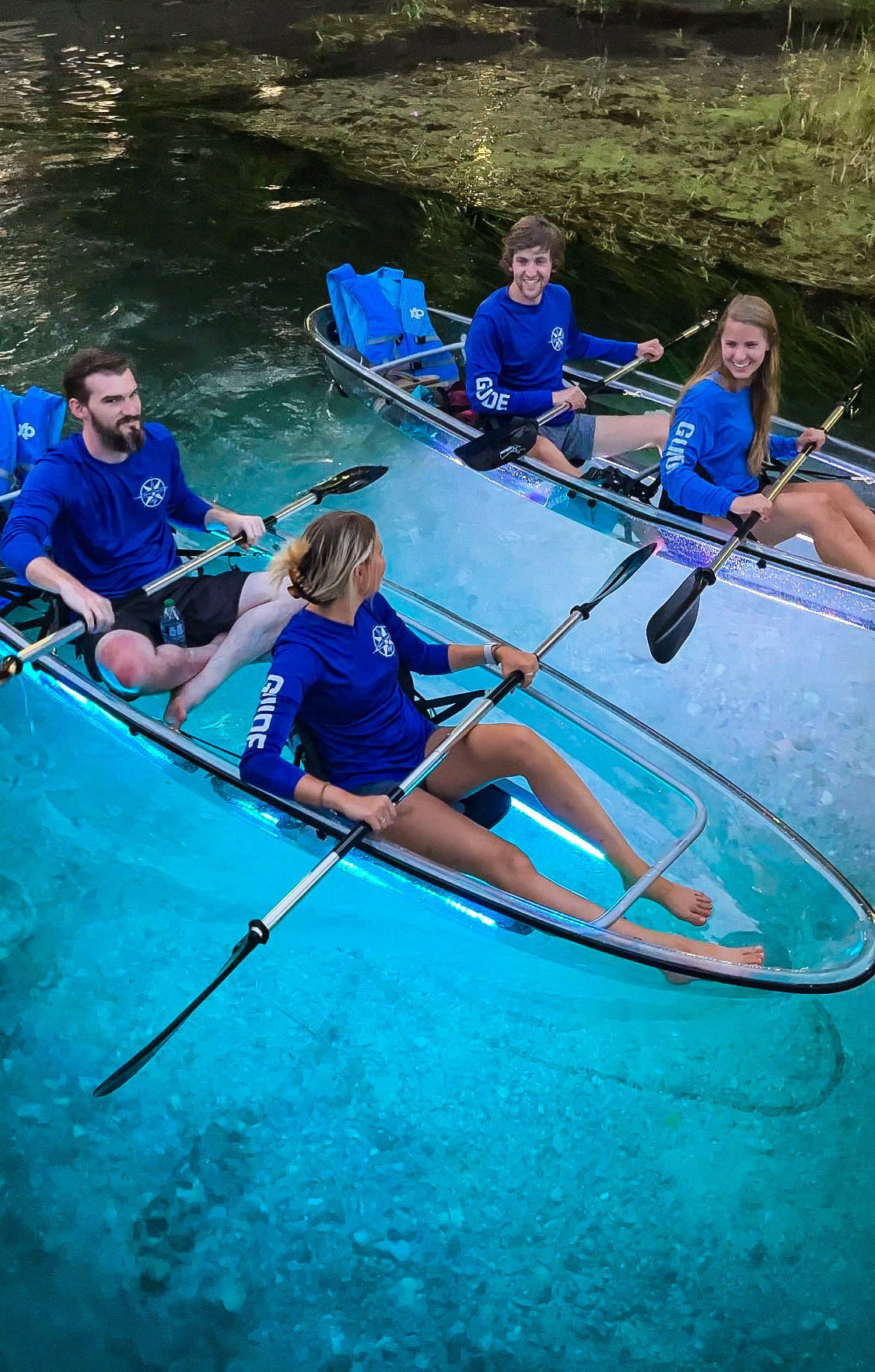 shared24 a group of people on a boat in the water