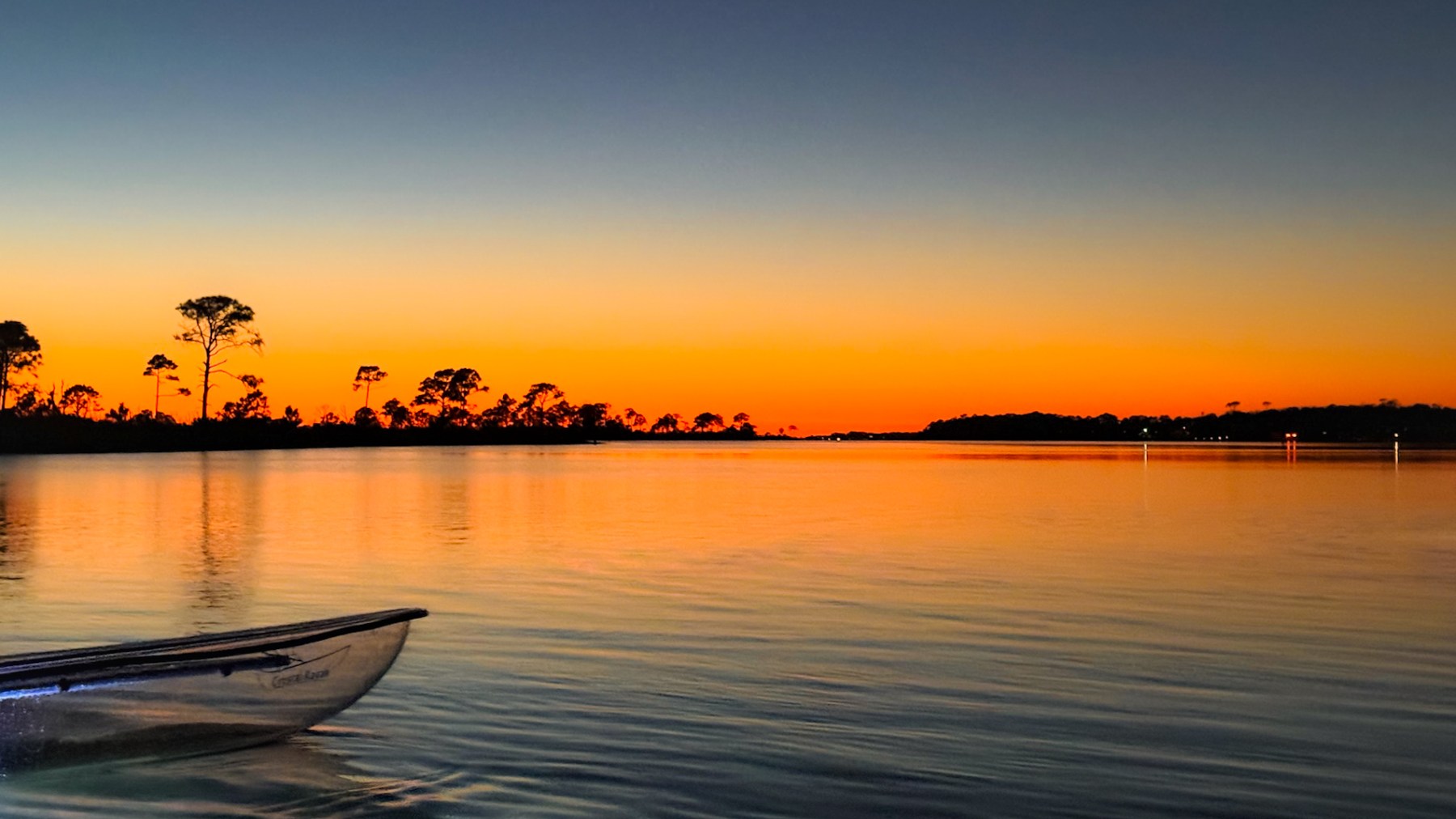 a small boat in a body of water