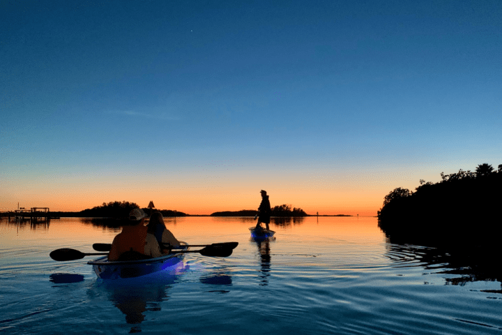a small boat in a body of water