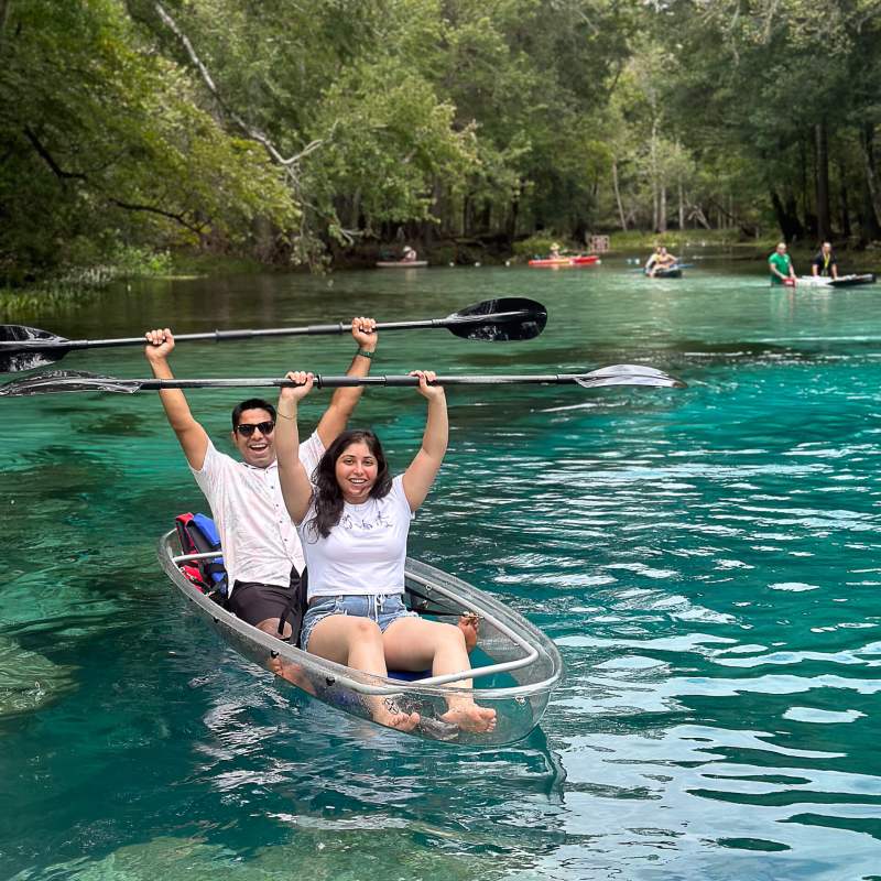 a group of people swimming in the water