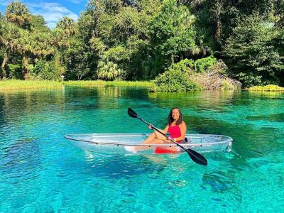 a person rowing a boat in the water