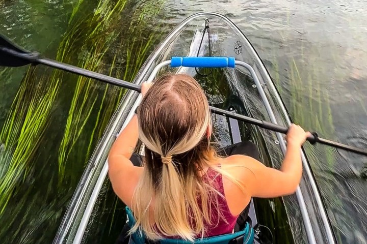 a girl in a pool of water