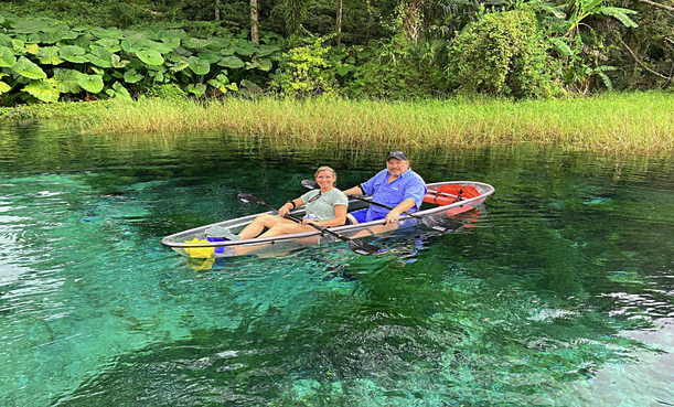 a man rowing a boat in the water