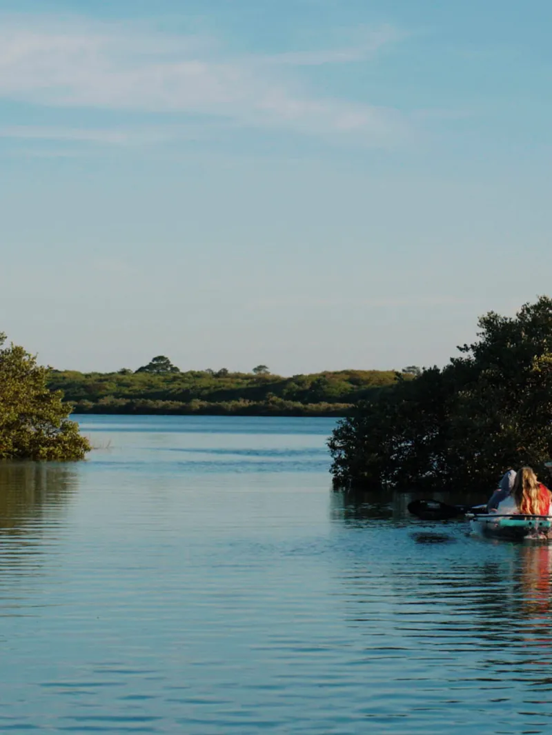 a small boat in a body of water