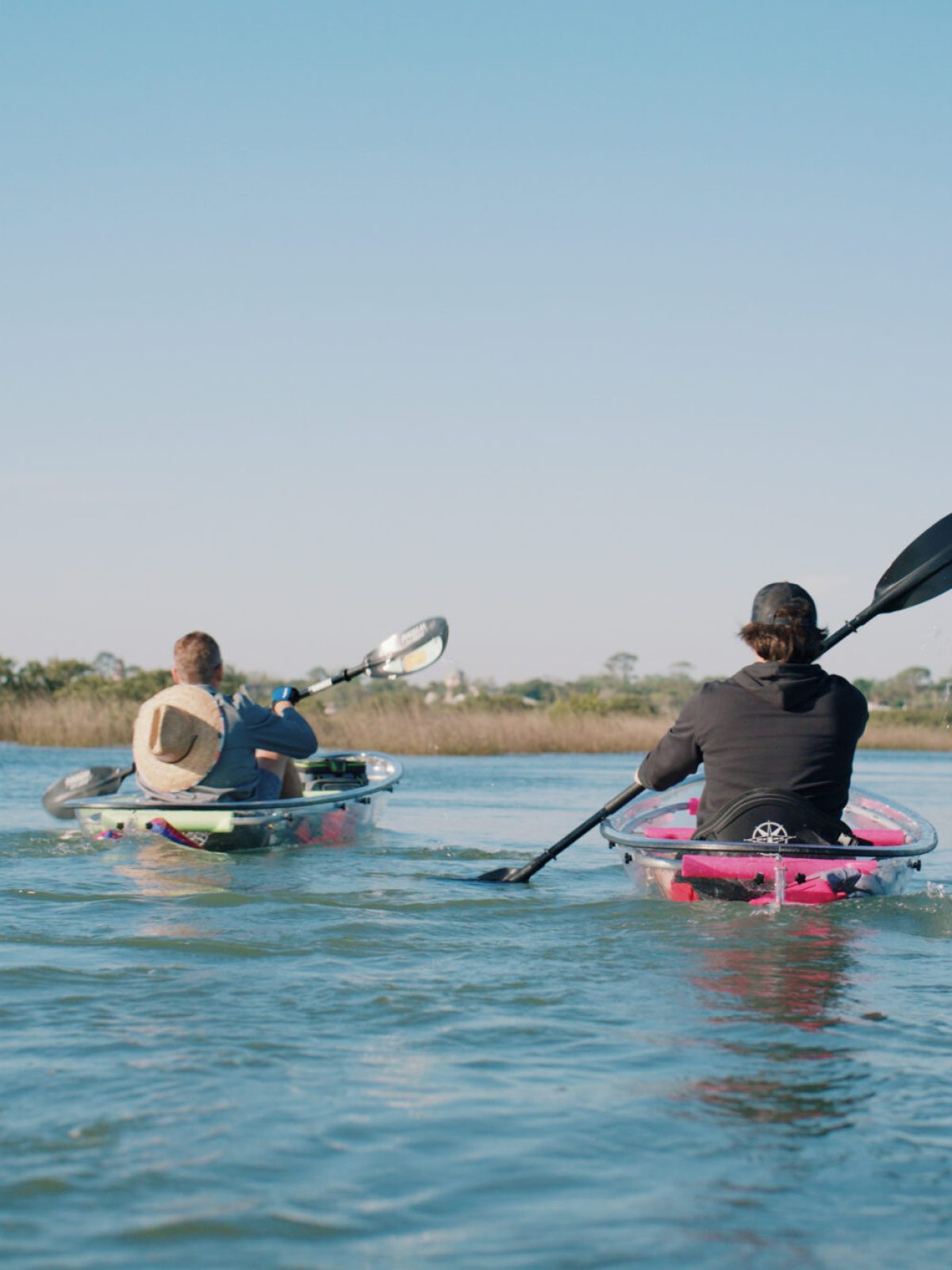 a man rowing a boat in the water