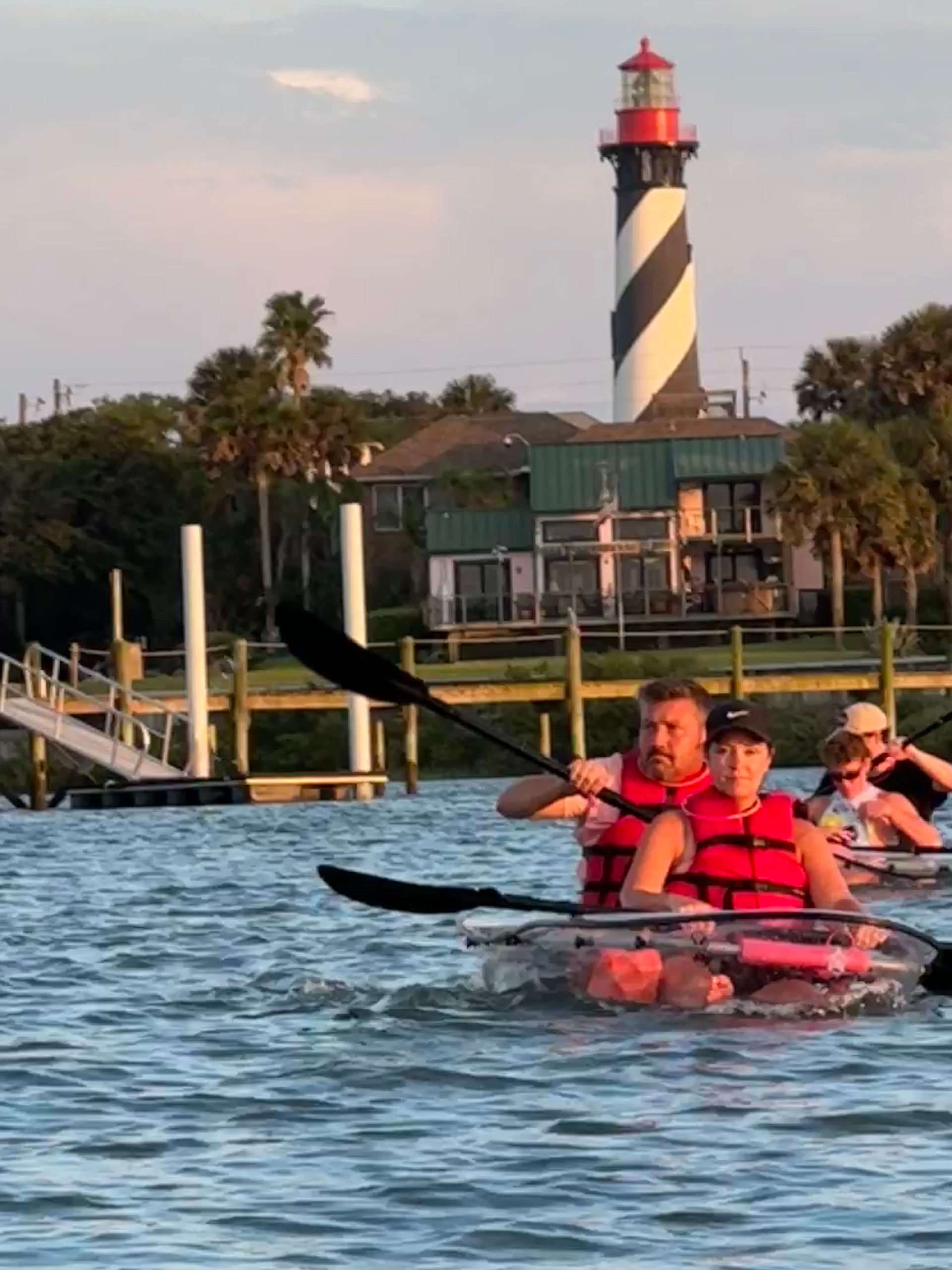 a group of people in a pool of water