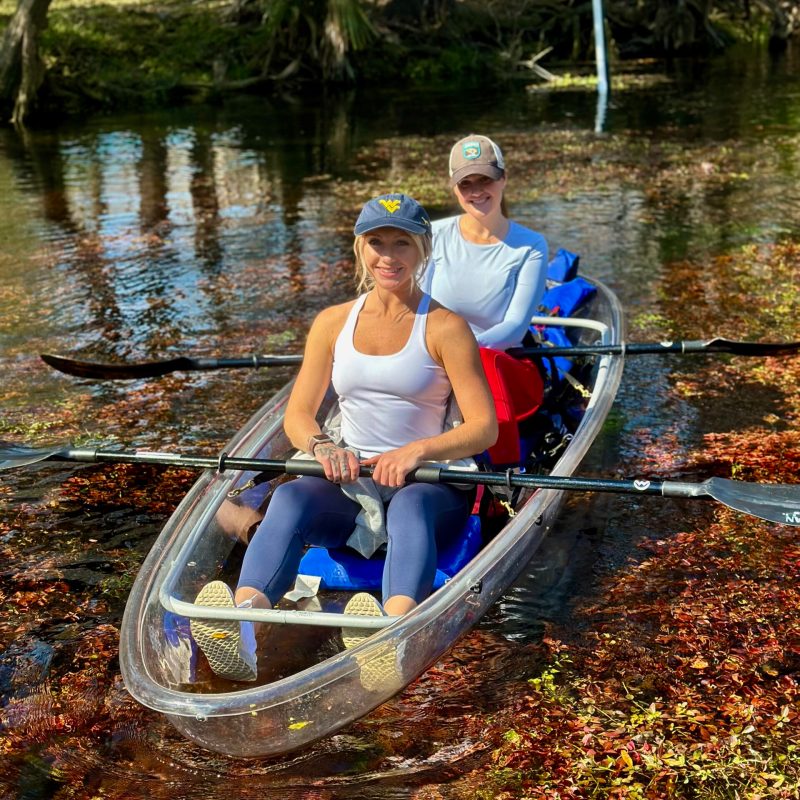 a person rowing a boat in a body of water