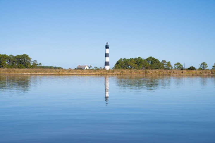 a small boat in a large body of water