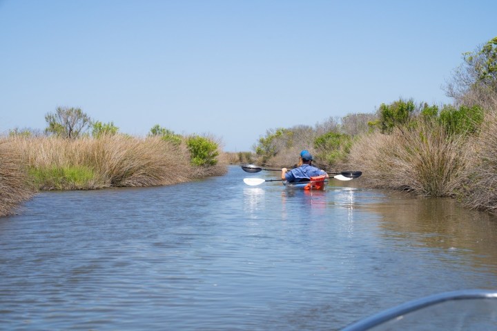 a small boat in a body of water