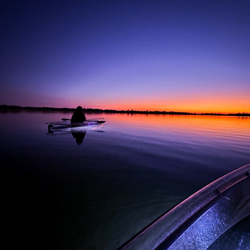 a sunset over a body of water