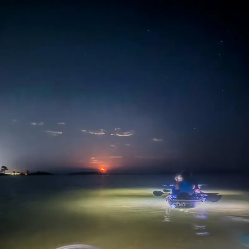 a small boat in a body of water