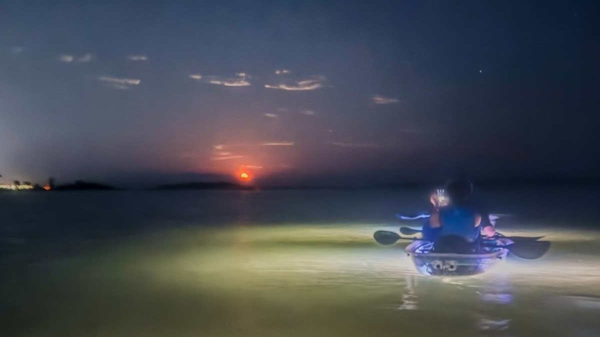 a person riding a jet ski in the water