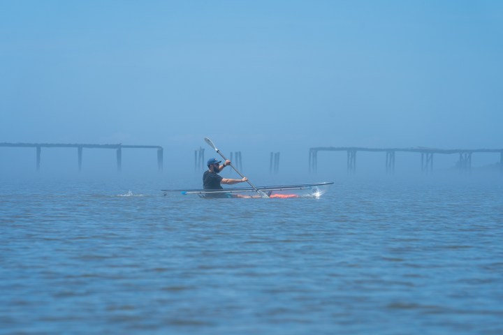 a small boat in a body of water