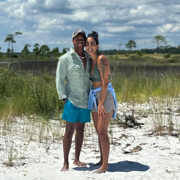 a person standing on a beach