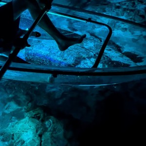 a bench in a dark room