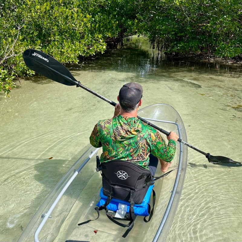 a person sitting on a bicycle