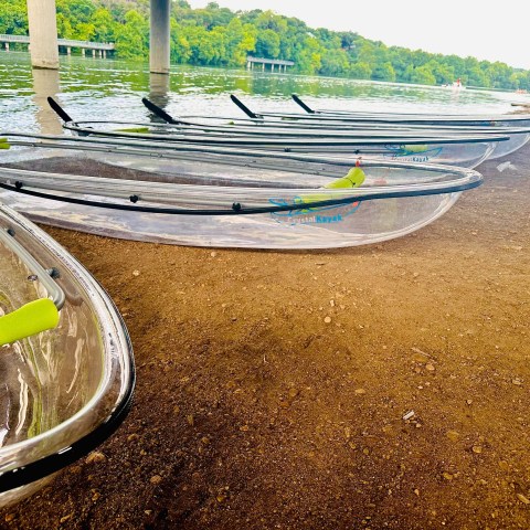 a boat sitting on top of a beach