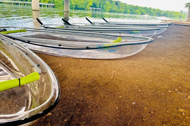 a boat sitting on top of a beach